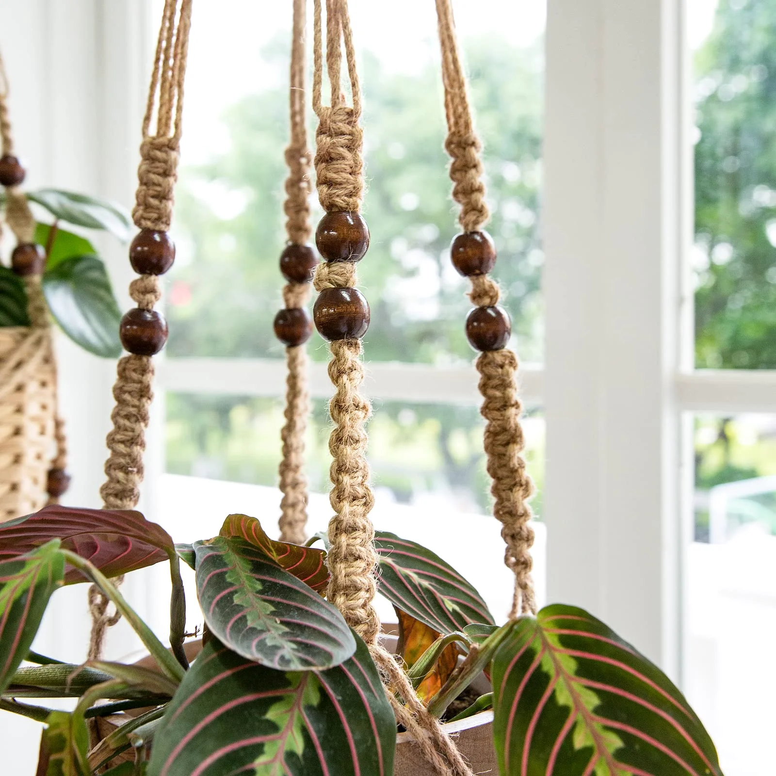 Wooden beads on the legs of a 35-inch hanger. The drop is measured from the ring, not from the beads.