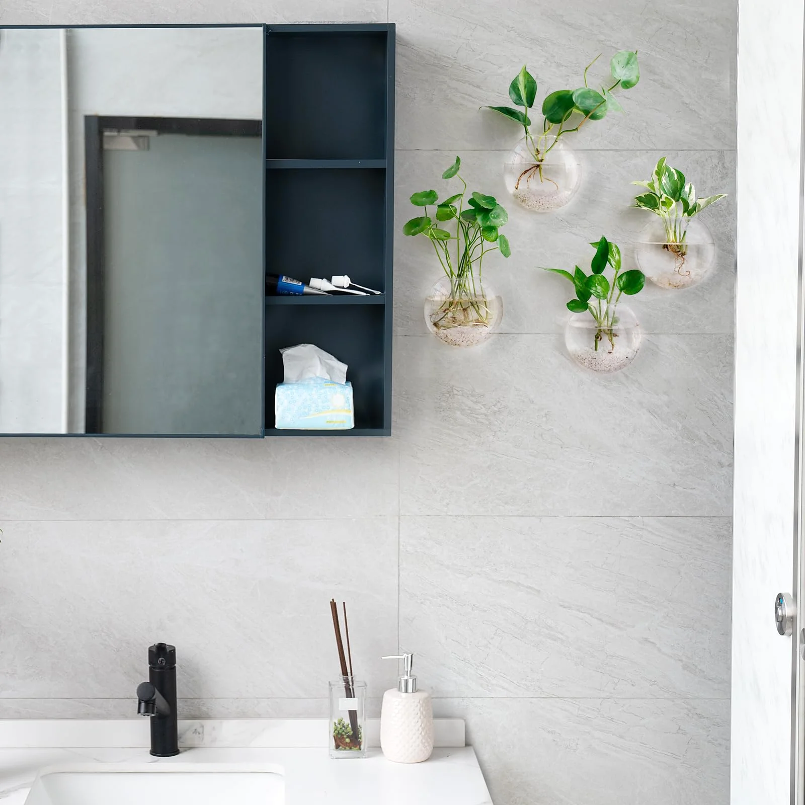 Propagation glass: tubes, globes and the stands that hold them